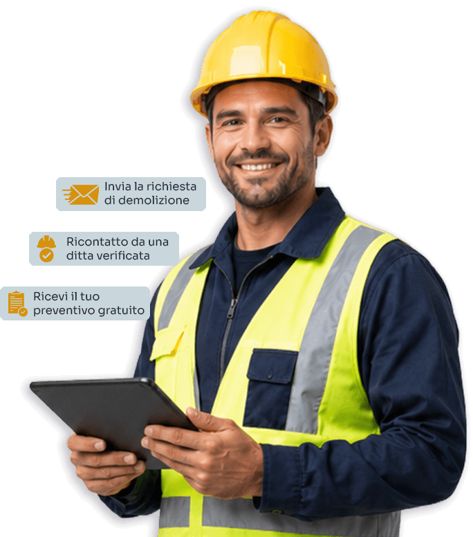 Operaio edile con casco giallo e tablet